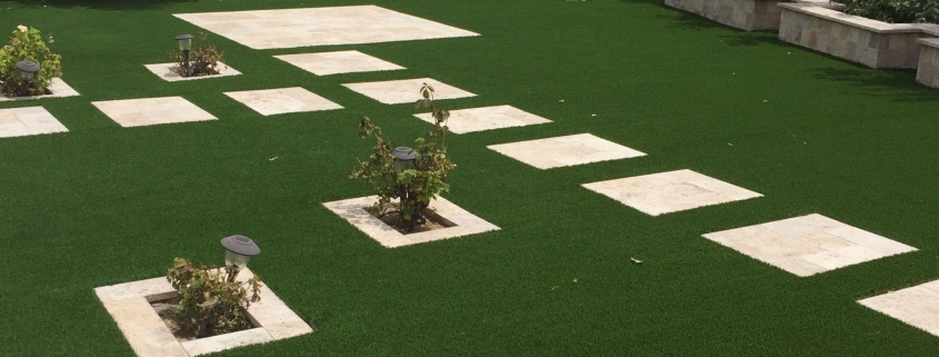 Artificial grass lawn with stepping stones