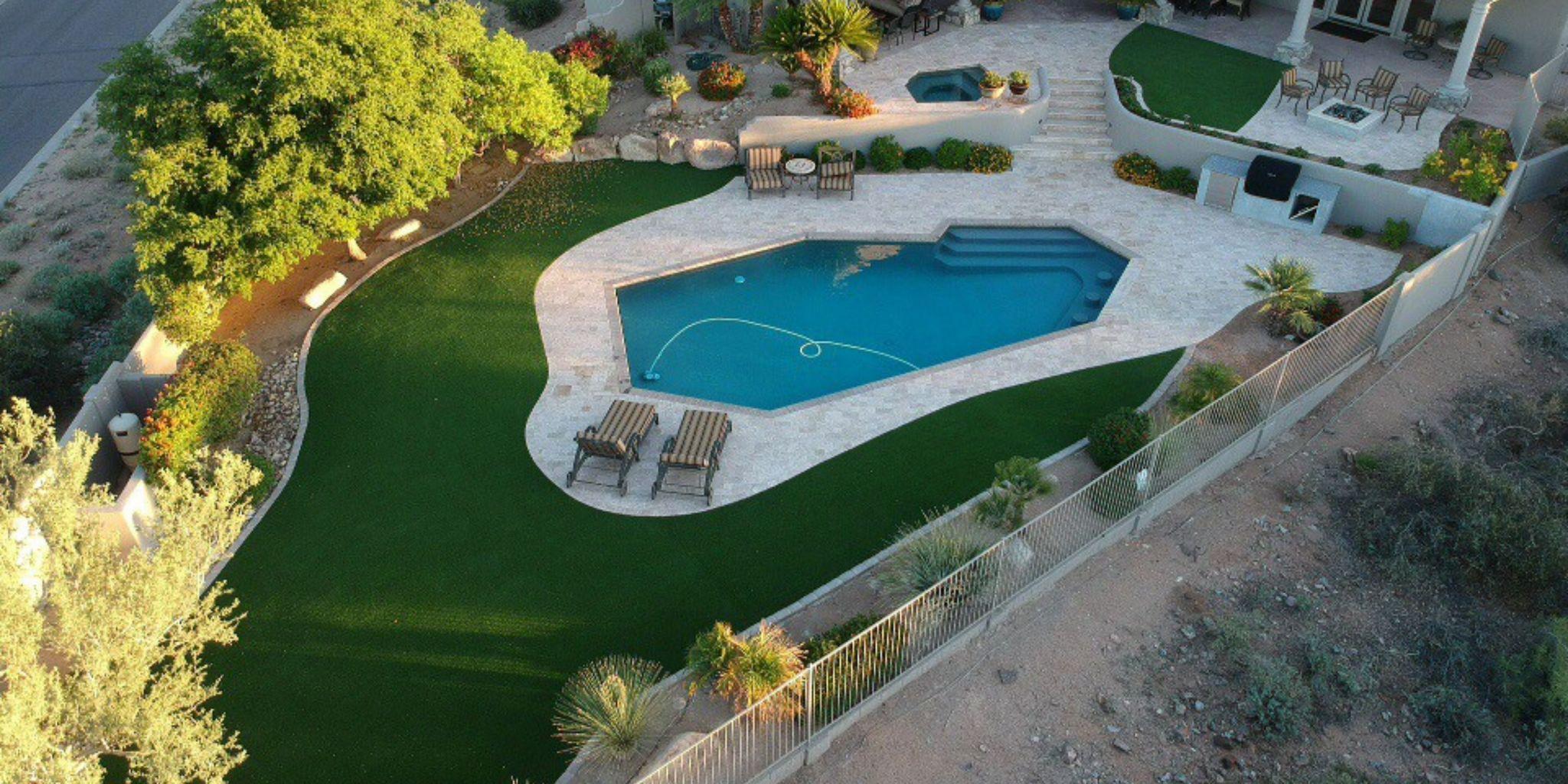 Aerial view of backyard with swimming pool