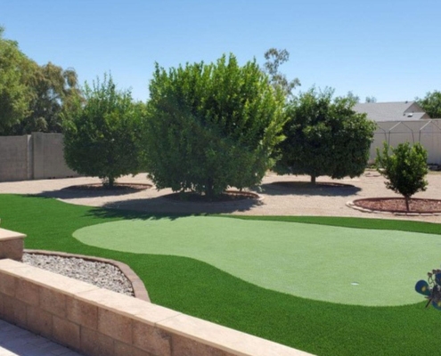 Artificial turf backyard putting green