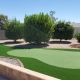 Artificial turf backyard putting green