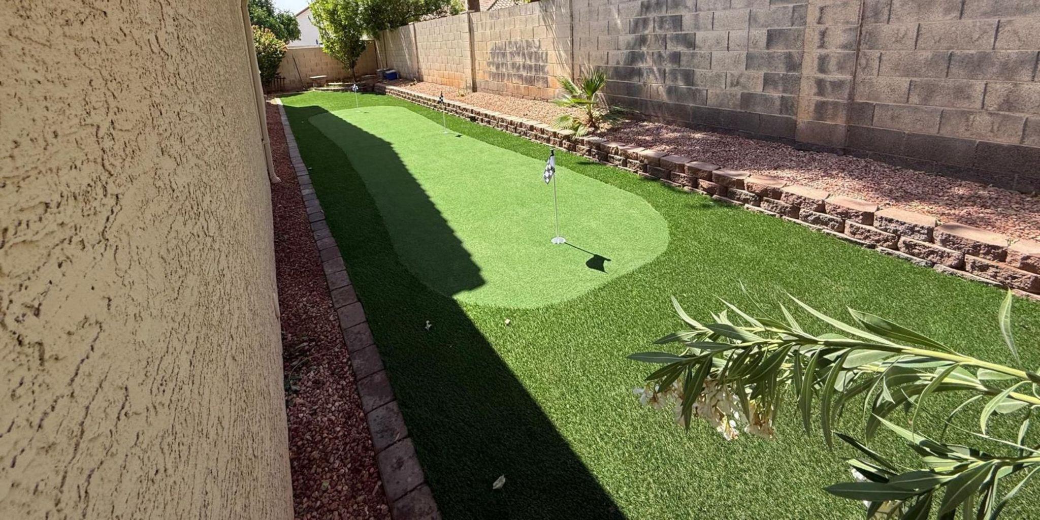 Artificial Turf Putting Green with a golf hole in a narrow backyard
