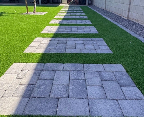Artificial Turf Putting Green with stone pavers