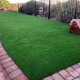 Backyard with a curved brick walkway