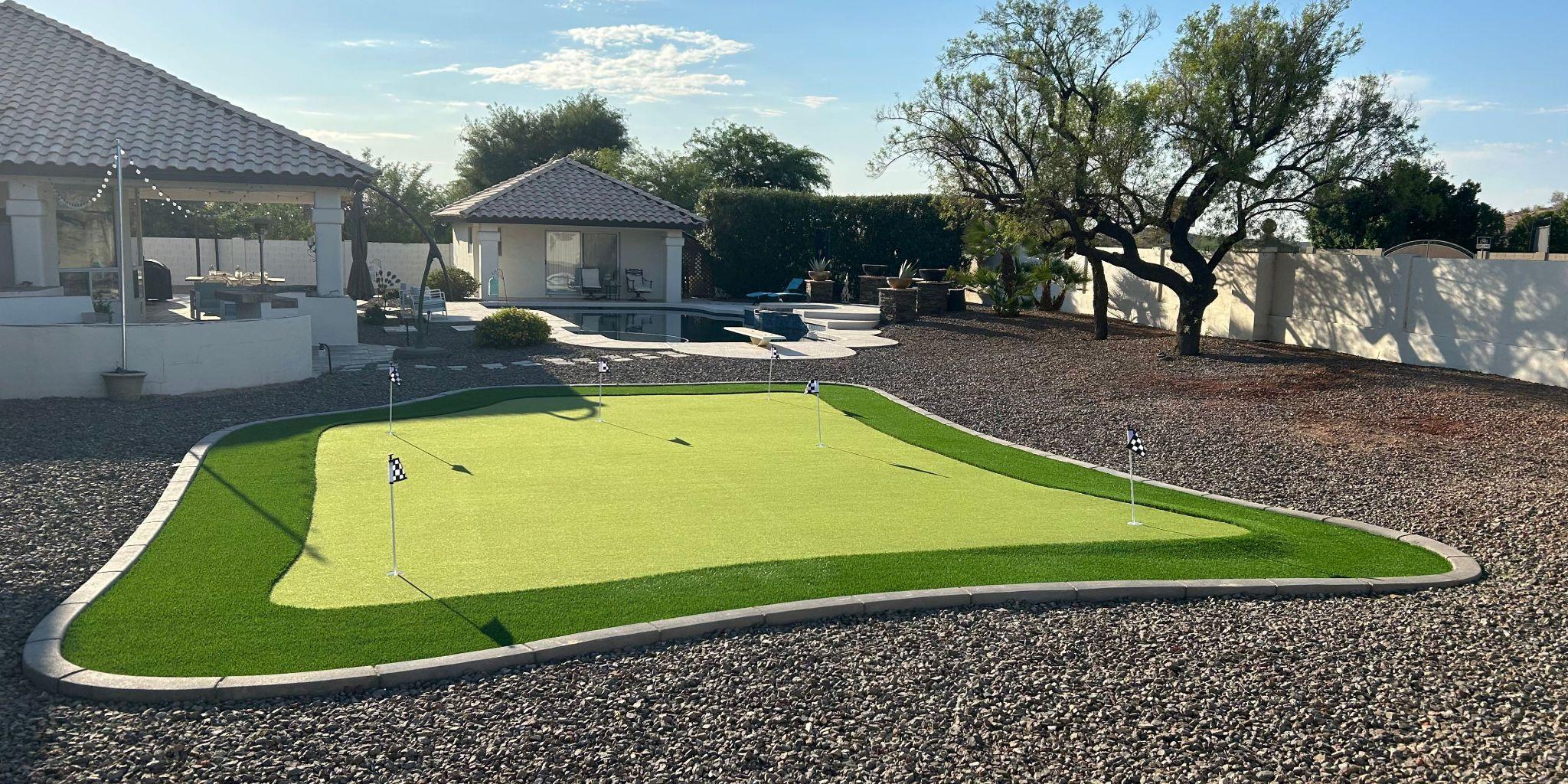  Large backyard putting green with multiple holes 